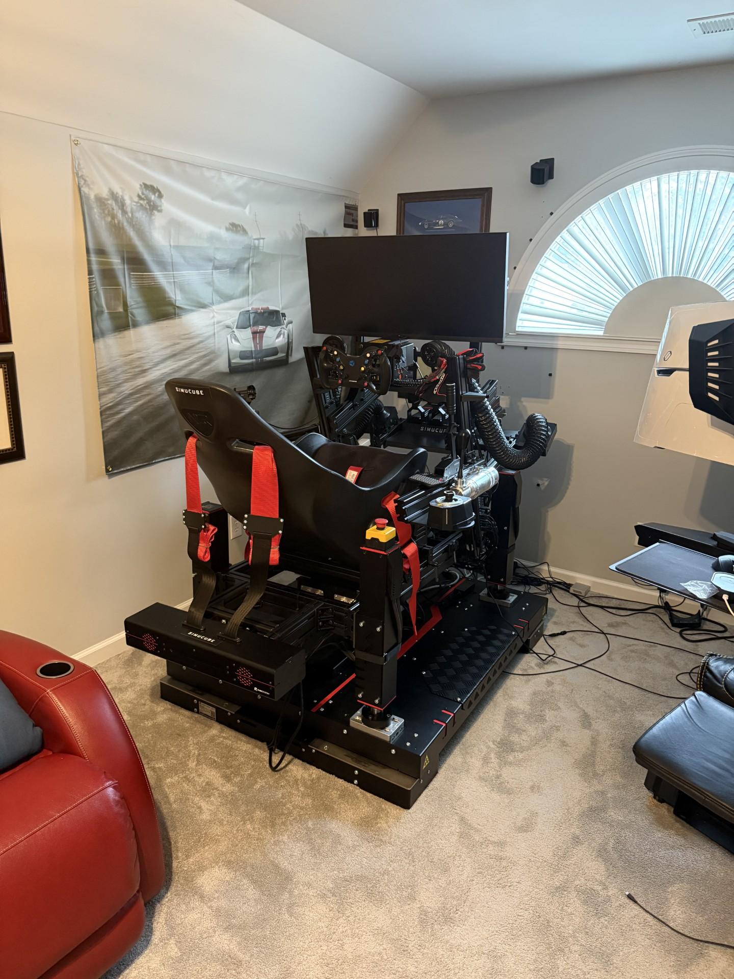 Next Level Rig with full Simucube configuration.  Simucube 2 pro with Simucube 3 Pro on the way.  3 Simucube Ultimate pedals.  Flight sim controls available to use.  BigScreen Beyond 2 VR.  Qubic QS-220 with QS-CH2 traction loss surge.  Over $42000 in the rig.